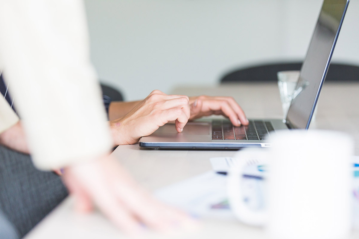 hands-using-computer-in-office-ok.jpg